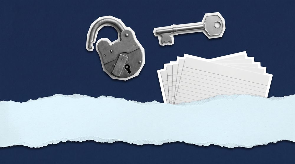 Editorial collage of an open padlock and a membership card file